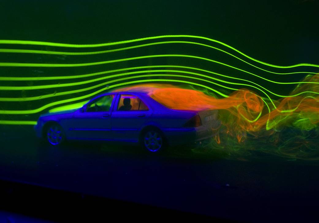 Toy car in wind tunnel showing stable and turbulent flow